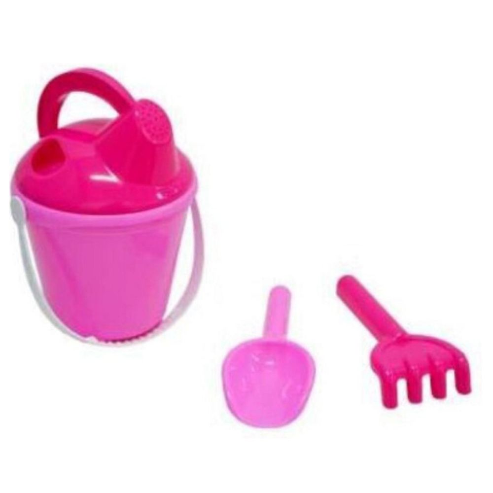 cubo rosa de juguete para la arena con pala y rastrillo